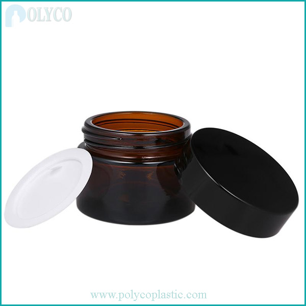 Brown glass jar with black plastic lid